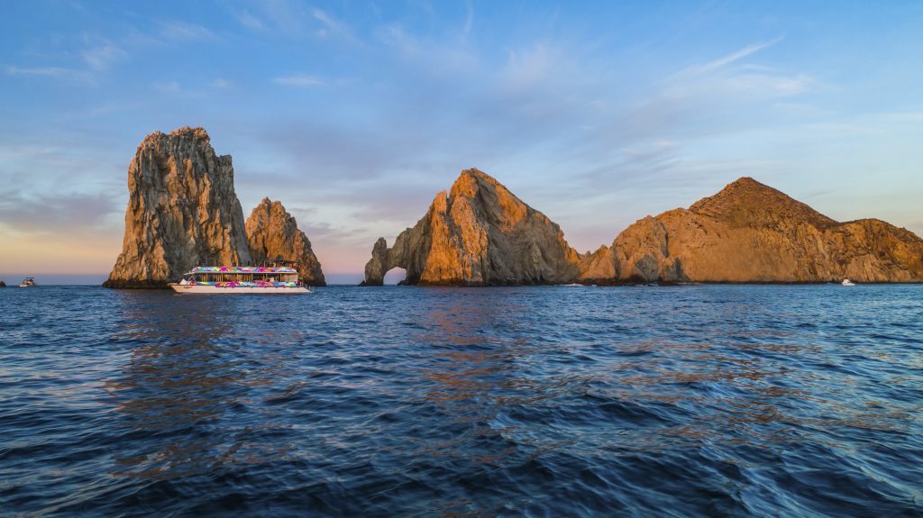Los Cabos famous attractions pelican rock, lover's beach, sea lion colony Cabo San Lucas Arch full open bar onboard dj music snacks sail the Pacific Ocean. Cabo sunset pacific oceanbest party boat